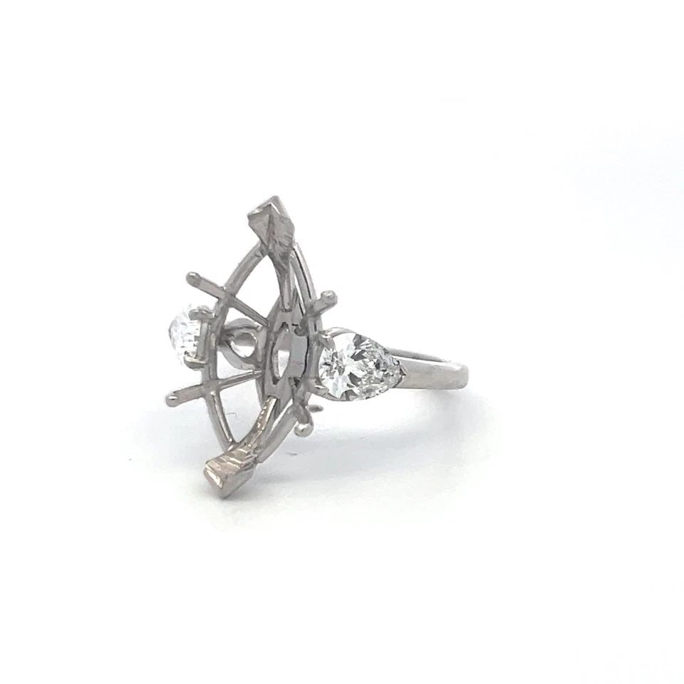 PLATINUM SEMI MOUNT RING WITH 0.94 CARAT PEAR DIAMOND FITS 17.3X8.9MM 5.50CT++: PLATINUM SEMI MOUNT RING WITH 0.94 CARAT PEAR DIAMOND FITS 17.3X8.9MM 5.50CT++ Detailed Description: This vintage platinum semi mount ring combines elegance with versatility, featuring two pear-shaped