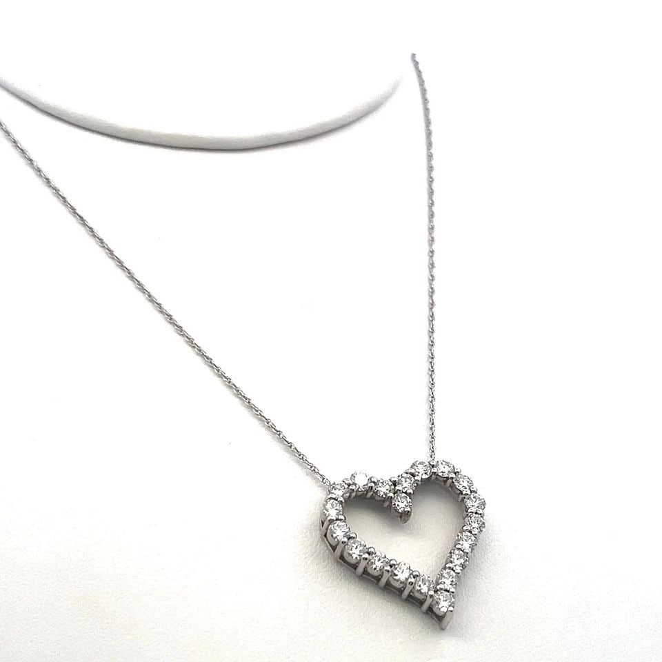 VINTAGE 14K WHITE GOLD PENDANT NECKLACE WITH 2 CARAT ROUND DIAMONDS: VINTAGE 14K WHITE GOLD PENDANT NECKLACE WITH 2 CARAT ROUND DIAMONDS Detailed Description: 2 Carat Diamond Heart Pendant Necklace, 14K White Gold, VVS2 Clarity DESCRIPTION: Elevate your elegance with t