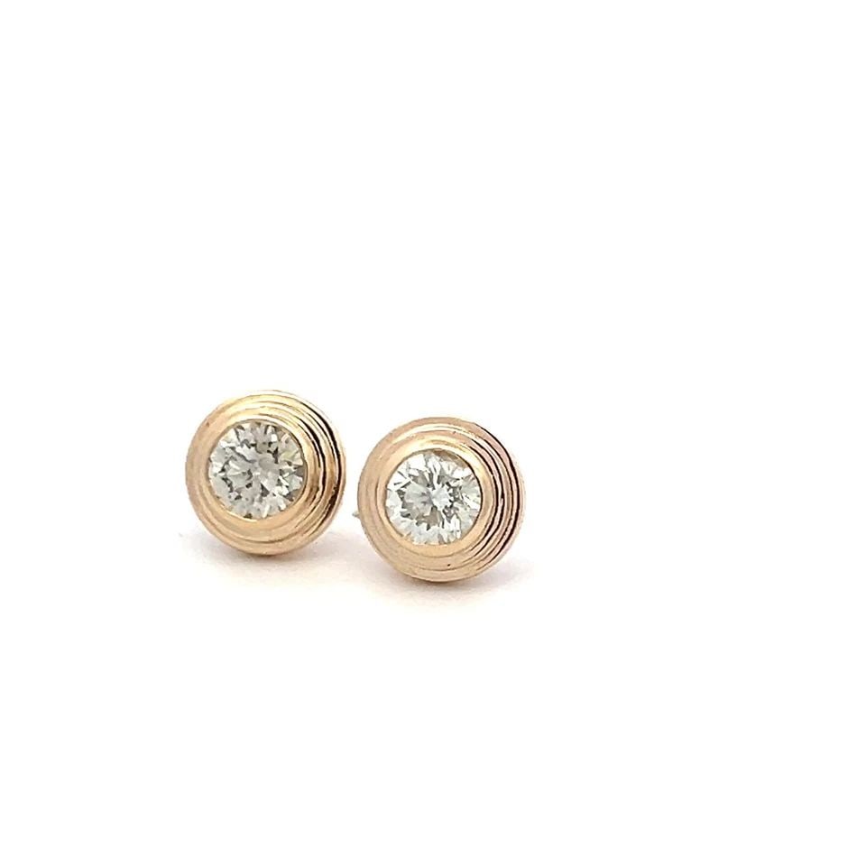 1.17 CARAT ROUND BRILLIANT K VS DIAMOND 18K YELLOW GOLD STUD EARRINGS: 1.17 CARAT ROUND BRILLIANT K VS DIAMOND 18K YELLOW GOLD STUD EARRINGS 1.17 Carat Round Brilliant K VS Diamond 18 Karat Yellow Gold Stud Earrings 18k Details Department Unisex Adults Main Stone Diamond