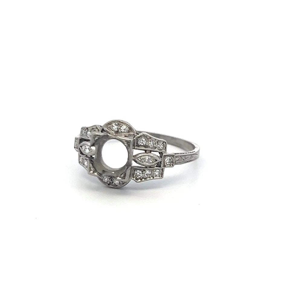 VINTAGE PLATINUM SEMI MOUNT RING WITH H VS OLD EUROPEAN CUT DIAMONDS: VINTAGE PLATINUM SEMI MOUNT RING WITH H VS OLD EUROPEAN CUT DIAMONDS Detailed Description: Experience luxury with this vintage platinum semi-mount ring, showcasing an elegant design adorned with 18 ol