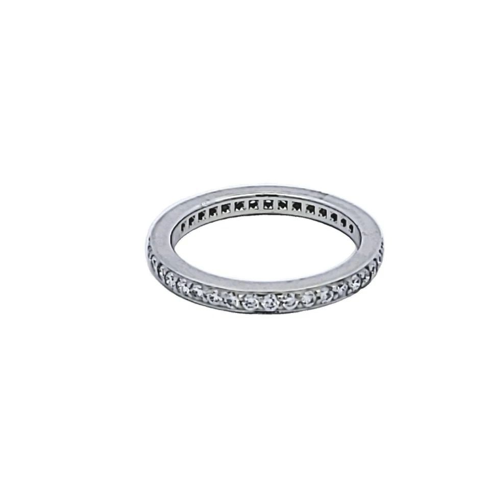 TIFFANY & CO 0.25 CARAT ROUND BRILLIANT F VS1 DIAMOND PLATINUM BAND RING: TIFFANY & CO 0.25 CARAT ROUND BRILLIANT F VS1 DIAMOND PLATINUM BAND RING Designer: Tiffany & Co Title: Tiffany & Co 0.25 Carat Round Brilliant F VS1 Diamond Platinum Band Ring Style: Band Metal: Plati