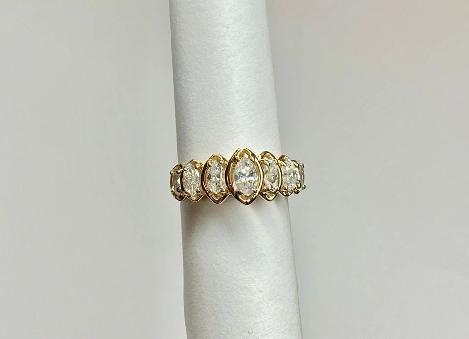 WOMEN'S 14K YELLOW GOLD RING WITH 1.0CTW MARQUISE NATURAL DIAMONDS (SIZE 5.75): WOMEN'S 14K YELLOW GOLD RING WITH 1.0CTW MARQUISE DIAMONDS (SIZE 5.75) Women's 14k Yellow Gold Ring with Marquise Diamonds (Size 5.75) You are bidding on a pre-owned Women's 14k Yellow Gold Ring with 