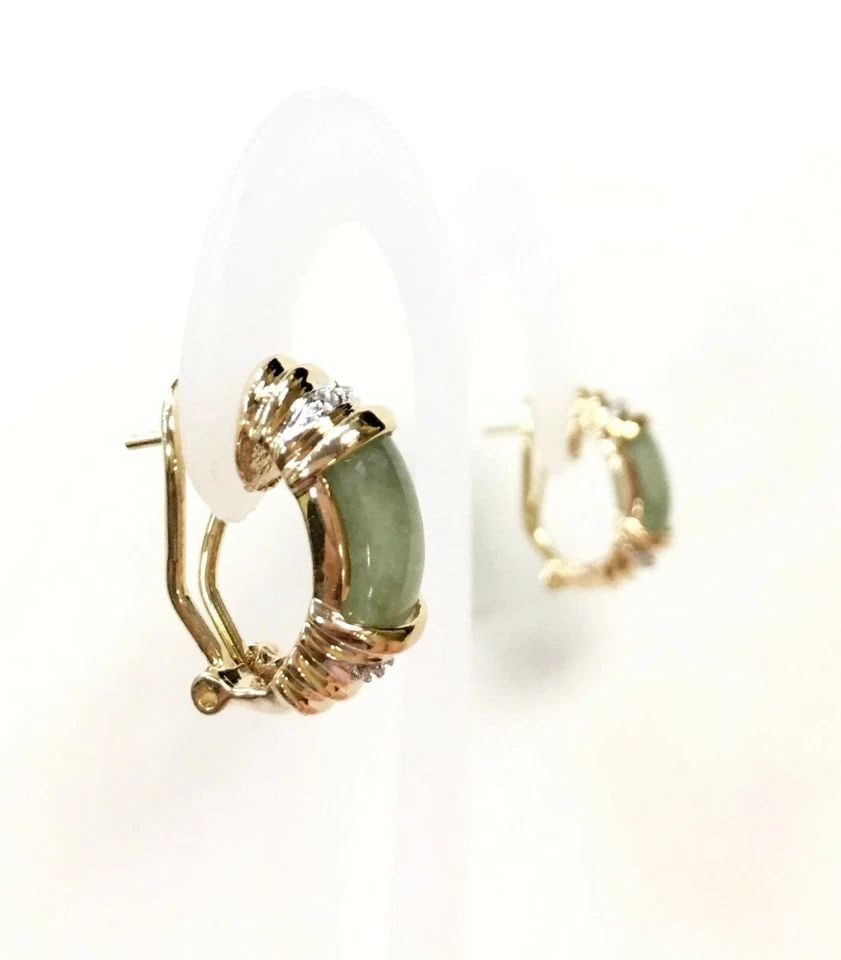14K YELLOW GOLD EARRINGS OMEGA BACKS WITH JADE AND 0.08CTS OF DIAMONDS 6.1G: 14K YELLOW GOLD EARRINGS OMEGA BACKS WITH JADE AND DIAMONDS 14k Yellow Gold Earrings Omega backs with Jade and Diamonds You are bidding on a 14k Yellow Gold Earrings Omega backs with Jade and Diamonds