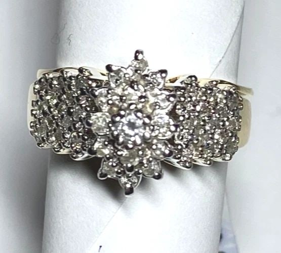 14K GOLD RING WITH BLUE LAPIS AND 0.12CTW DIAMONDS (SIZE 6.5) 5.7 GRAMS: 14k Gold Ring set with center Blue Lapis and 0.12cts of Diamonds Condition: Used Material: 14k Yellow Gold Ring Size: 6.5 Weight: 5.7 grams Top Width: 14mm Bottom Width: 2.6mm Stone Info: Center stone