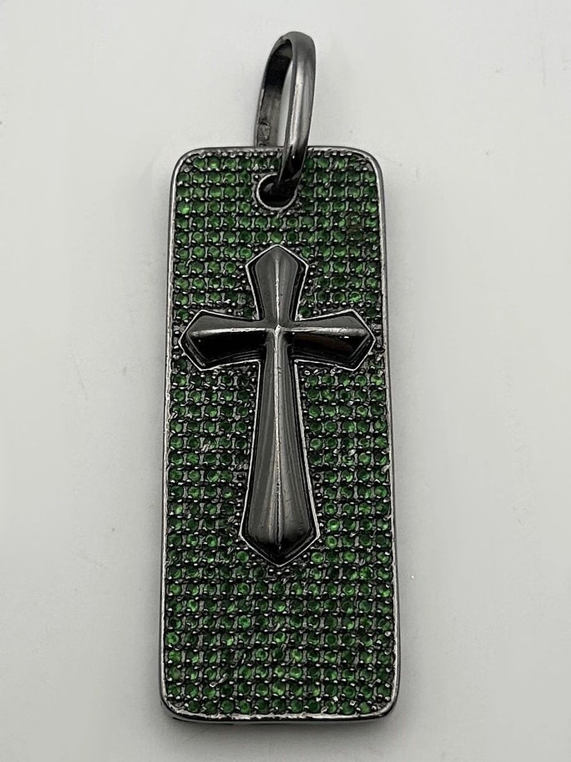 925 STERLING SILVER CROSS PENDANT, BLACK RHODIUM PLATING, GREEN C.Z. 30.6 GRAMS: 925 Sterling Silver Cross Pendant, Black Rhodium Plating, Green C.Z. Condition: Used Material: 925 Sterling Silver, with black rhodium plating on top, which gives it that darker color Pendant Size: 3 