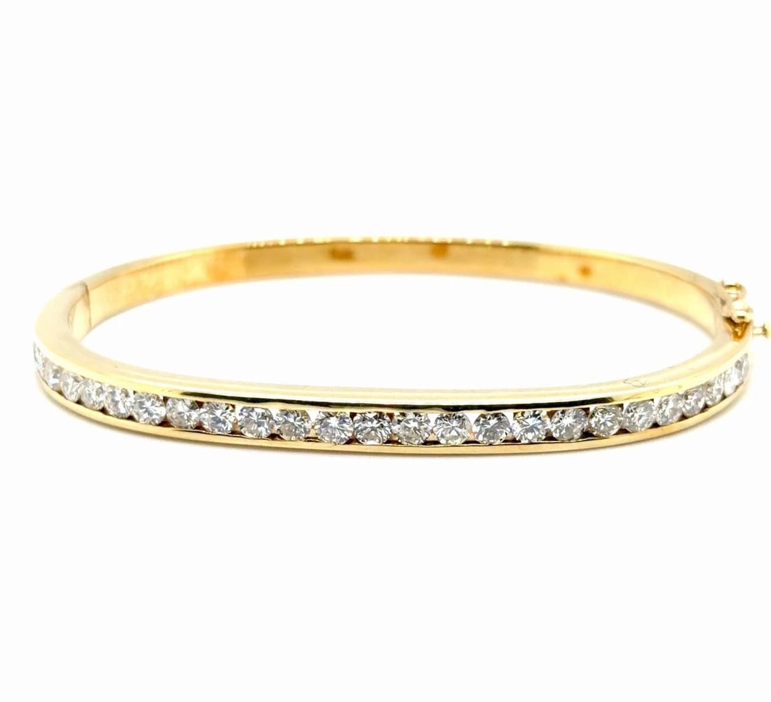 18K GOLD AND DIAMOND ESTATE BRACELET WITH 3.50 TDW NATURAL DIAMONDS VS-SI: 18K GOLD AND DIAMOND ESTATE BRACELET WITH 3.50 TDW NATURAL DIAMONDS VS-SI 18k Yellow Gold Natural Diamond Estate Bracelet Featuring 3 50-carats of Round Brilliant Cut Diamonds set in Yellow Gold Diamo