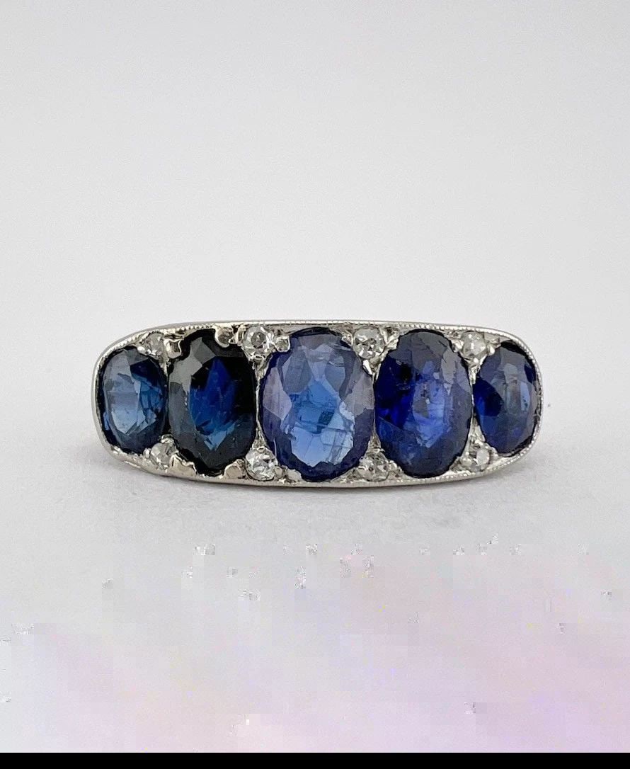 ANTIQUE 1920'S ART DECO PLATINUM OLD OVAL CUT SAPPHIRE & DIAMOND FILIGREE RING: ANTIQUE 1920'S ART DECO PLATINUM OLD OVAL CUT SAPPHIRE & DIAMOND FILIGREE RING Antique 1920's Art Deco Platinum Old Oval Cut Sapphire & Diamond Filigree Ring Size: 6.5- Can Be Sized To Any Size Withou