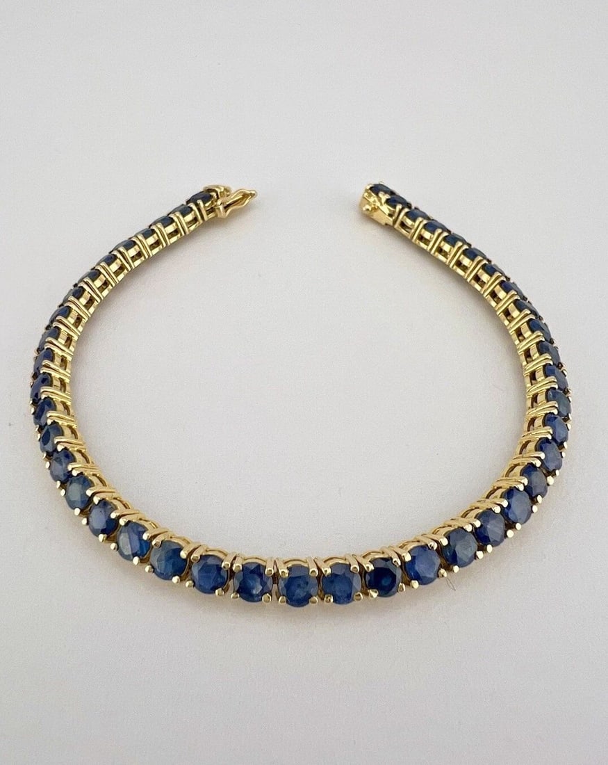 DESIGNER YELLOW GOLD 8.80CT APPROX ROUND BLUE SAPPHIRE TENNIS BRACELET 6.75: DESIGNER YELLOW GOLD 8.80CT APPROX ROUND BLUE SAPPHIRE TENNIS BRACELET 6.75” Designer Yellow Gold 8.80ct Approx. Round Blue Sapphire Tennis Bracelet 6.75" Size: 6.75" Long By (4mm) Wide Metal: H