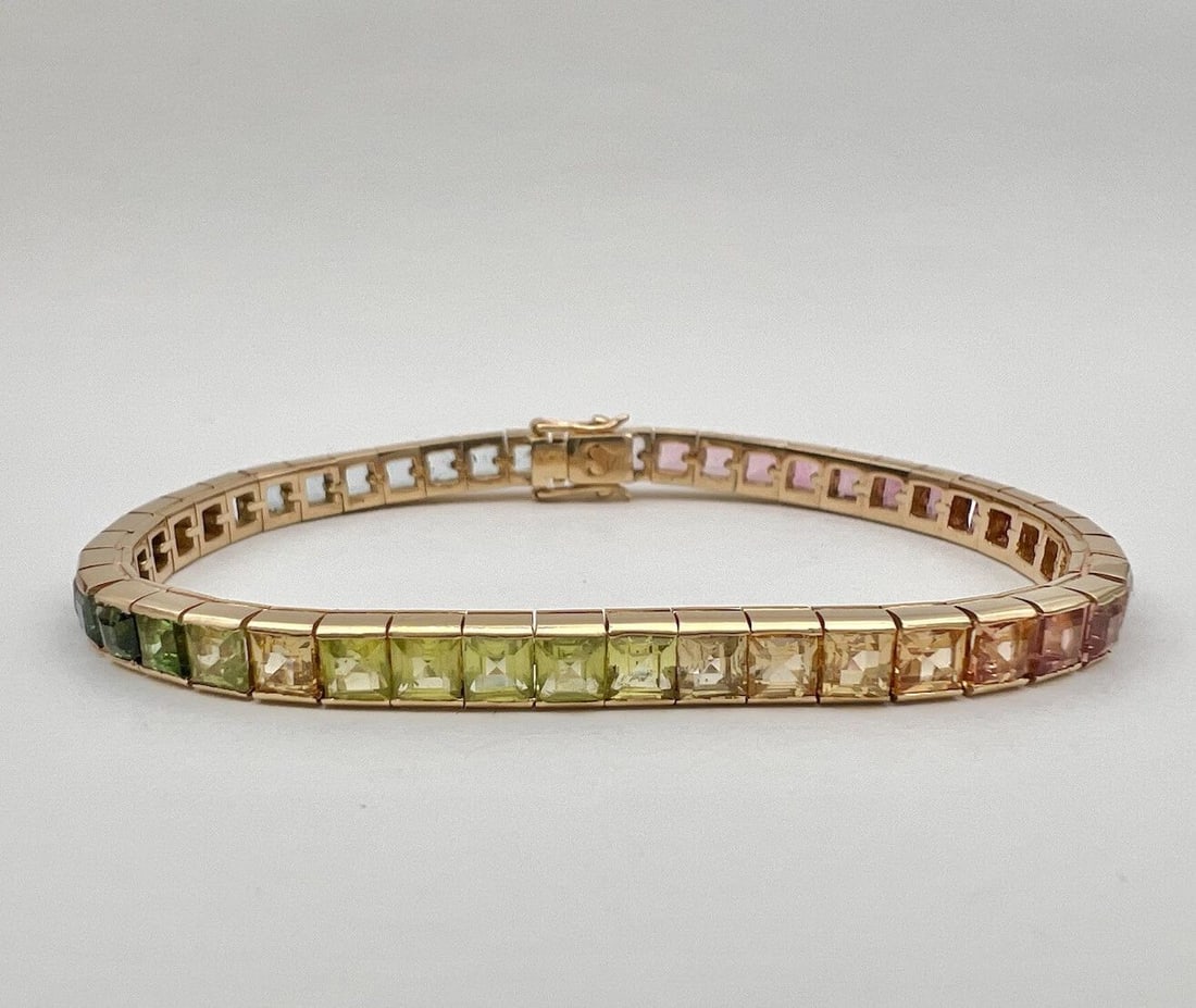 DESIGNER 14K YELLOW GOLD MULTICOLOR GEMSTONE RAINBOW TENNIS BRACELET 18.5G: DESIGNER 14K YELLOW GOLD MULTICOLOR GEMSTONE RAINBOW TENNIS BRACELET 18.5G Designer 14k Yellow Gold Multicolor Gemstone Rainbow Tennis Bracelet Metal: 14k Yellow Gold Weight is 18.5 Grams on my scale 