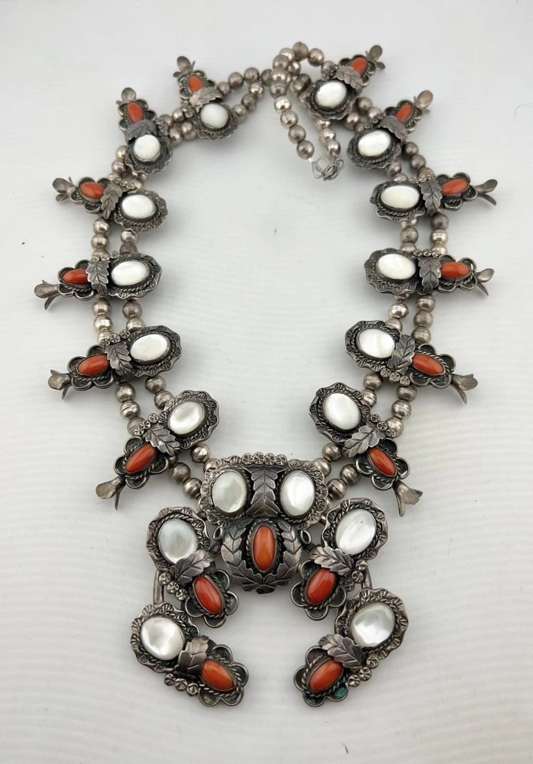 VTG NAVAJO STERLING SILVER CORAL MOTHER OF PEARL SQUASH BLOSSOM NECKLACE 308.8G: VTG NAVAJO STERLING SILVER CORAL MOTHER OF PEARL SQUASH BLOSSOM NECKLACE 308.8G Vintage Navajo Sterling Silver Red Coral & Mother Of Pearl Squash Blossom Necklace 308.8g This Amazing necklace features