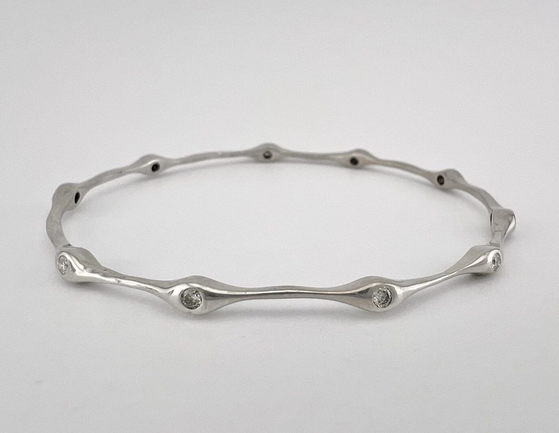 SONIA BITTON 14K WHITE GOLD MODERNIST ETERNITY DIAMOND STATION BANGLE BRACELET: SONIA BITTON 14K WHITE GOLD MODERNIST ETERNITY DIAMOND STATION BANGLE BRACELET SONIA BITTON 14K White Gold Modernist Eternity Diamond Station Bangle BraceletWeight 8.5 grams on my Sclae Size small, wi