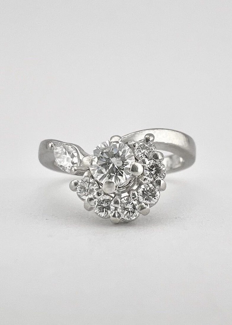 DESIGNER .900 PLATINUM VS 0.57TCW ROUND & MARQUISE DIAMOND CLUSTER RING: DESIGNER .900 PLATINUM VS 0.57TCW ROUND & MARQUISE DIAMOND CLUSTER RING Designer .900 Platinum VS 0.57tcw Round & Marquise Diamond Cluster Ring Ring Size 5.5 - Can Be Resized Weight is 6.2 Grams on my