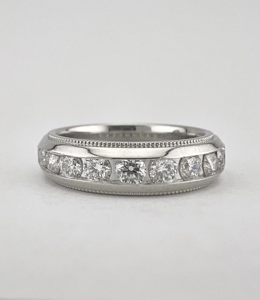 DESIGNER DIANA PLATINUM & VS .75CT APPROX DIAMOND MILGRAIN WEDDING BAND RING: DESIGNER DIANA PLATINUM & VS .75CT APPROX DIAMOND MILGRAIN WEDDING BAND RING Designer Diana Platinum .75ct Approx Diamond Milgrain Wedding Band Ring Ring Size: 6 Weight is 9.0 Grams on my scale Metal: