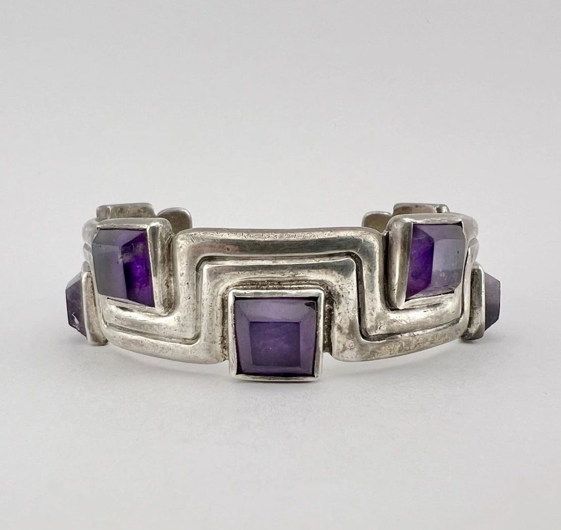 EARLY 1940'S HECTOR AGUILAR MEXICO TAXCO STERLING SILVER AMETHYST CUFF BRACELET: EARLY 1940'S HECTOR AGUILAR MEXICO TAXCO STERLING SILVER AMETHYST CUFF BRACELET Early 1940's Hector Aguilar Mexico Taxco Sterling Silver Amethyst Cuff Bracelet Cuff Size: Slightly Over 5" Tip To Tip w