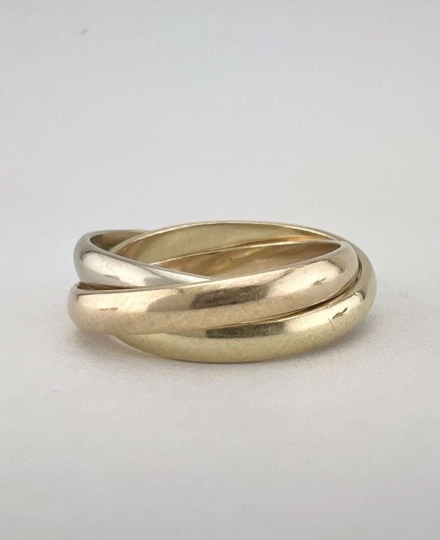 VINTAGE TRINITY 14K TRI COLOR GOLD ROLLING 3 BAND RING: VINTAGE TRINITY 14K TRI COLOR GOLD ROLLING 3 BAND RING Vintage Trinity 14k Tri Color Gold Rolling 3 Band Ring Ring Size: 7 Metal: 14k Tri Color Gold - Hallmarked Weight is 6.7 Grams on my scale Amazin