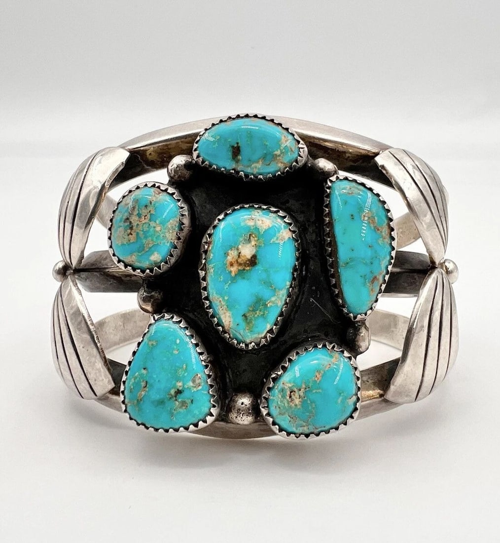 VINTAGE NAVAJO STERLING SILVER BLUE GEM TURQUOISE CARINATED CUFF BRACELET 94.8G: VINTAGE NAVAJO STERLING SILVER BLUE GEM TURQUOISE CARINATED CUFF BRACELET 94.8G Vintage Navajo Sterling Silver Blue Gem Turquoise Carinated Cuff Bracelet 94.8g Cuff is 5" tip to Tip and has a 1 1/8" S