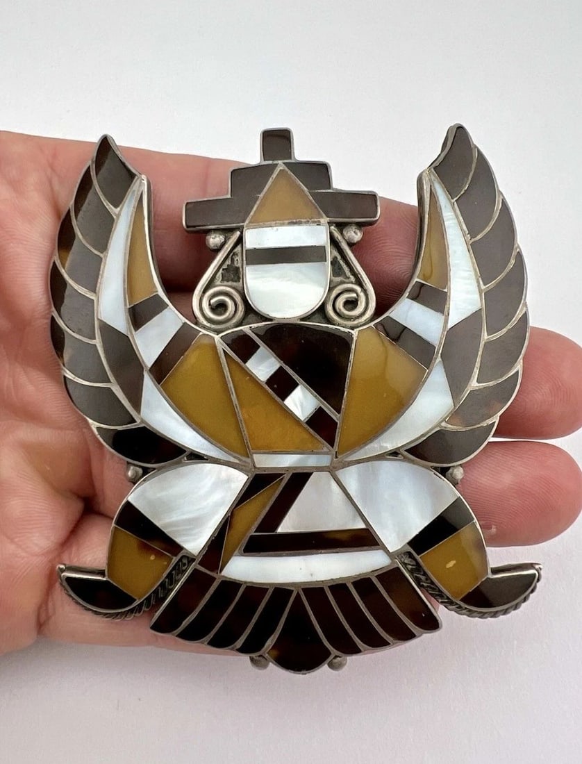 RARE LARGE VINTAGE ZUNI MULTI-INLAY KNIFEWING STERLING SILVER PIN BROOCH 3.25": RARE LARGE VINTAGE ZUNI MULTI-INLAY KNIFEWING STERLING SILVER PIN BROOCH 3.25" Rare LARGE Vintage ZUNI MULTI-INLAY KNIFEWING Sterling Silver Pin Brooch 3.25" Size: 3 1/4" Tall by 2 3/4" Wide Weight is