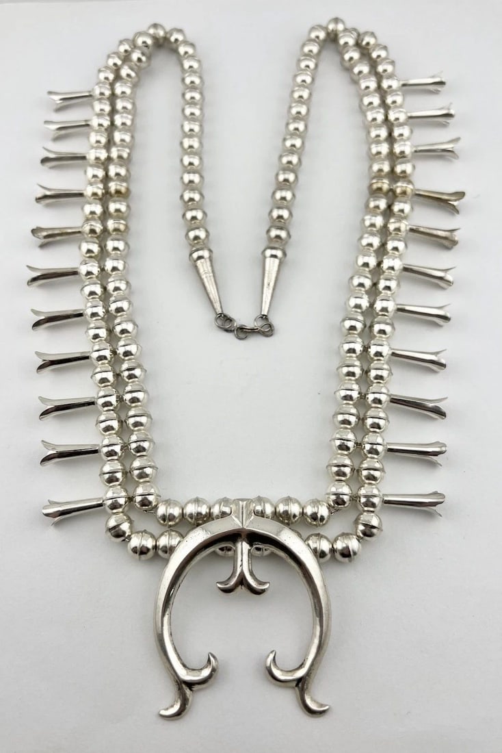 VINTAGE NAVAJO STERLING SILVER PEARL BENCH BEAD SQUASH BLOSSOM NECKLACE 29.5": VINTAGE NAVAJO STERLING SILVER PEARL BENCH BEAD SQUASH BLOSSOM NECKLACE 29.5" Vintage Navajo Sterling Silver Pearl Bench Bead Squash Blossom Necklace 29.5" This Amazing Necklace has 8.5mm Wide bench b