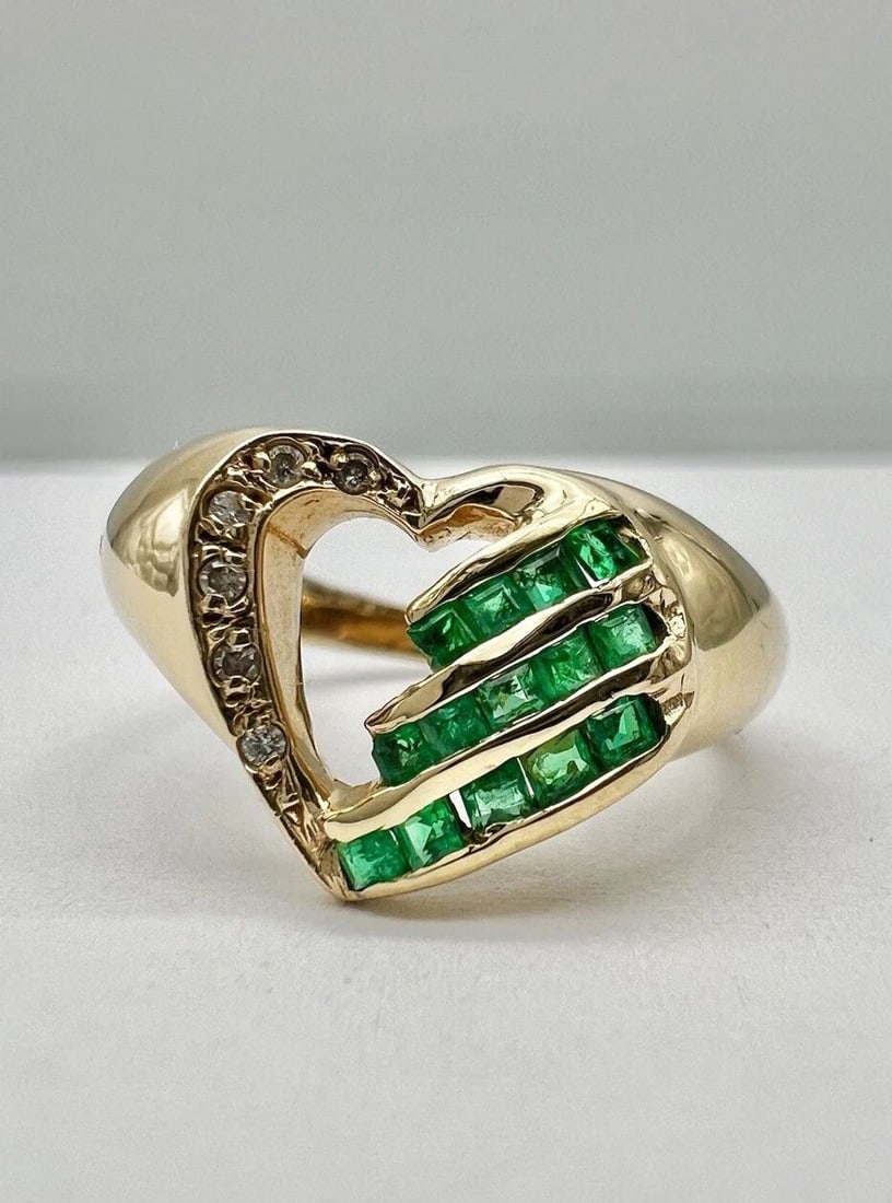 DESIGNER 18K YELLOW GOLD CHANNEL SET GREEN EMERALD & DIAMOND HEART LOVE RING: DESIGNER 18K YELLOW GOLD CHANNEL SET GREEN EMERALD & DIAMOND HEART LOVE RING Designer 18k Yellow Gold Channel Set Green Emerald & Diamond Heart Love Ring Size: 9.5 - Can Be Resized Weight is 4.6 Grams