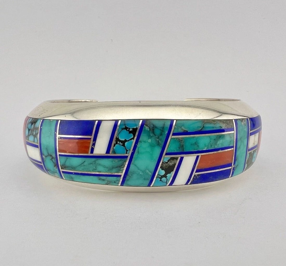 VTG PHILLIP SANCHEZ NAVAJO STERLING SILVER MULTI GEM FLUSH CUFF BRACELET 101G: VTG PHILLIP SANCHEZ NAVAJO STERLING SILVER MULTI GEM FLUSH CUFF BRACELET 101G Vtg Phillip Sanchez Navajo Sterling Silver Multi Gem Flush Cuff Bracelet 101g Cuff is 5 1/2" tip to Tip and has a 1 1/4" G