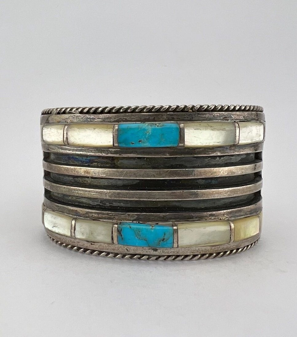 VTG NAVAJO STERLING SILVER TURQUOISE & MOTHER OF PEARL ROW CUFF BRACELET 119.3G: VTG NAVAJO STERLING SILVER TURQUOISE & MOTHER OF PEARL ROW CUFF BRACELET 119.3G Vtg Navajo Sterling Silver Turquoise & Mother Of Pearl Row Cuff Bracelet 119.3g Cuff is 5" tip to Tip and has a 1 1/2" W