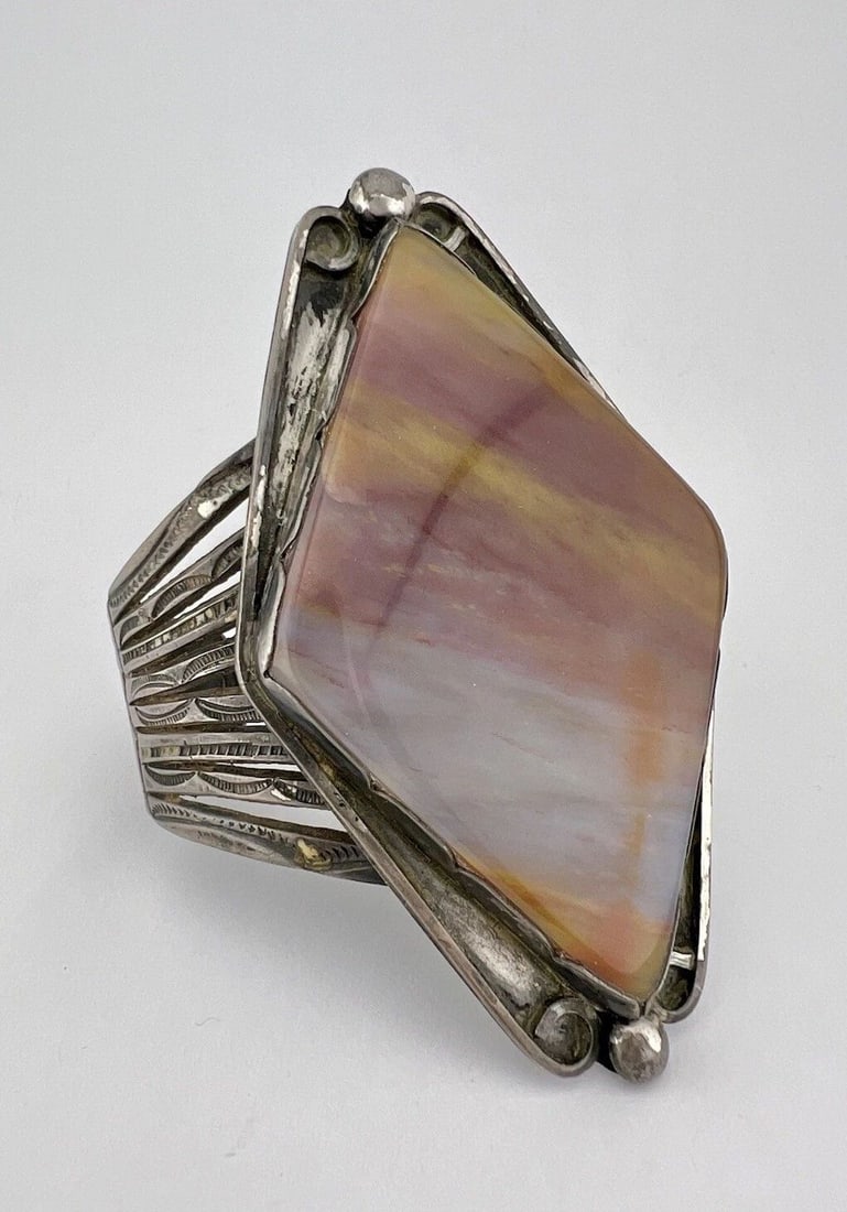 VTG FRED HARVEY NAVAJO COIN SILVER PETRIFIED WOOD 3.5" WIDE CUFF BRACELET 100.8G: VTG FRED HARVEY NAVAJO COIN SILVER PETRIFIED WOOD 3.5" WIDE CUFF BRACELET 100.8G Vtg Fred Harvey Navajo Coin Silver Petrified Wood 3.5" Wide Cuff Bracelet 100.8g Cuff is 6" tip to Tip and has a 7/8" W
