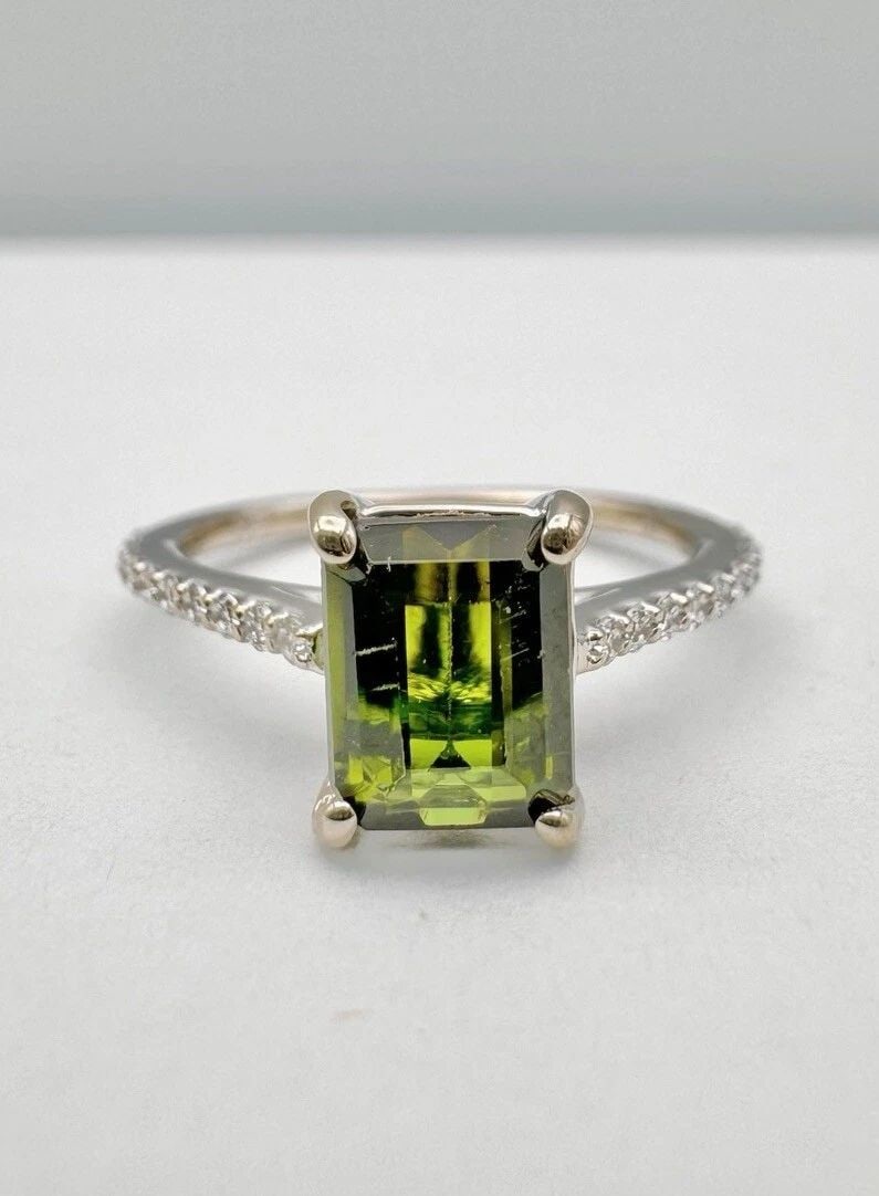 DESIGNER 14K WHITE GOLD CHROME GREEN TOURMALINE & DIAMOND ENGAGEMENT RING: DESIGNER 14K WHITE GOLD CHROME GREEN TOURMALINE & DIAMOND ENGAGEMENT RING Designer 14k White Gold Chrome Green Tourmaline & Diamond Engagement Ring Size: 6.75- Can Be Resized Metal: 14k White Gold Wei