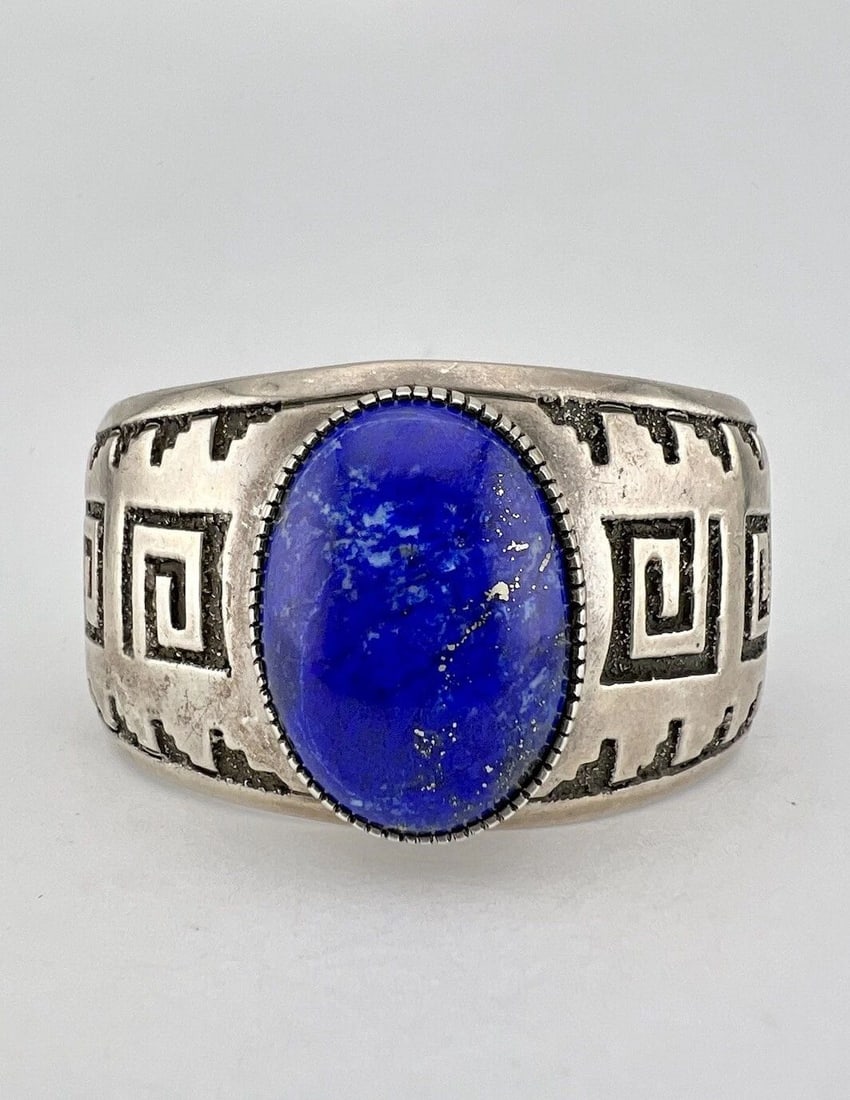 VTG RANDY HOSKIE NAVAJO STERLING SILVER OVERLAY LAPIS LAZULI CUFF BRACELET 93G: VTG RANDY HOSKIE NAVAJO STERLING SILVER OVERLAY LAPIS LAZULI CUFF BRACELET 93G Randy Hoskie Navajo Sterling Silver Overlay Stamped Lapis Lazuli Cuff Bracelet Cuff is 5 1/4" tip to Tip and has a 1 1/8"