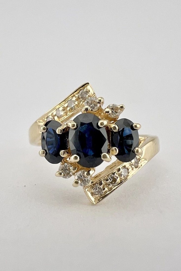 DESIGNER 14K YELLOW GOLD OVAL CUT BLUE SAPPHIRE & DIAMOND BYPASS RING (1 of 2)