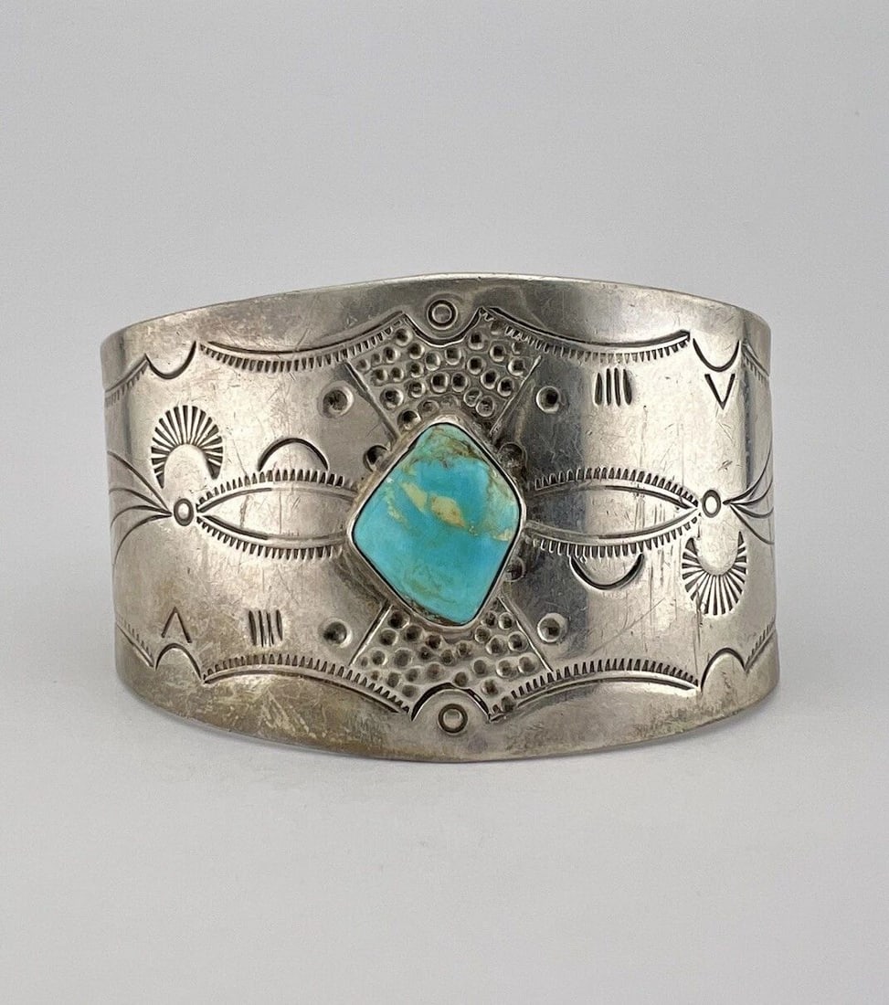 VTG FRED HARVEY ERA NAVAJO COIN SILVER TURQUOISE STAMPED WIDE CUFF BRACELET: VTG FRED HARVEY ERA NAVAJO COIN SILVER TURQUOISE STAMPED WIDE CUFF BRACELET Vtg Fred Harvey Era Navajo Coin Silver Turquoise Stamped Wide Cuff Bracelet Cuff is 5 1/2" tip to Tip and has a 1 1/2" Wide 