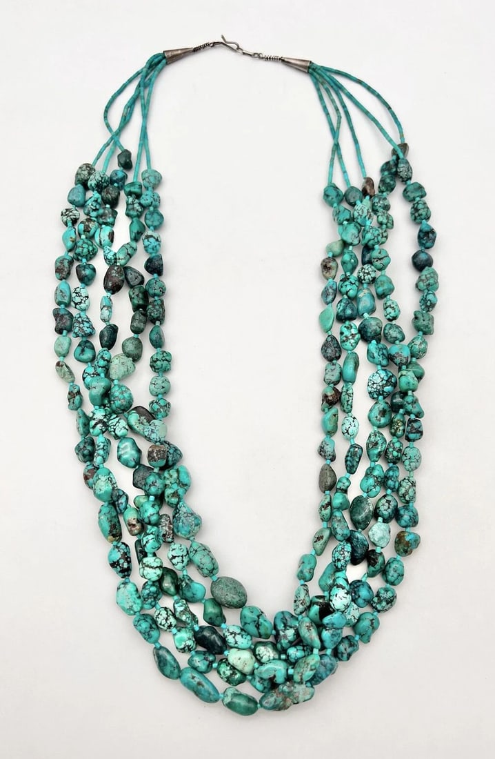 VTG SANTO DOMINGO KEWA KINGMAN TURQUOISE HEISHI 5 STRAND STERLING NECKLACE 30": VTG SANTO DOMINGO KEWA KINGMAN TURQUOISE HEISHI 5 STRAND STERLING NECKLACE 30" Vtg Santo Domingo Kewa Kingman Turquoise Heishi 5 Strand Sterling Necklace 30" The Stones are From 8mm to 11.5mm Wide Nec