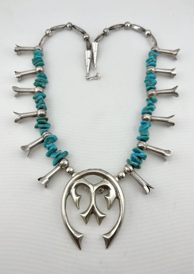 VTG 27" NAVAJO STERLING SILVER HEISHI TURQUOISE SQUASH BLOSSOM NECKLACE 120.5G: VTG 27" NAVAJO STERLING SILVER HEISHI TURQUOISE SQUASH BLOSSOM NECKLACE 120.5G Vtg 27" Navajo Sterling Silver Heishi Turquoise Squash Blossom Necklace 120.5g This Amazing necklace features Natural spe