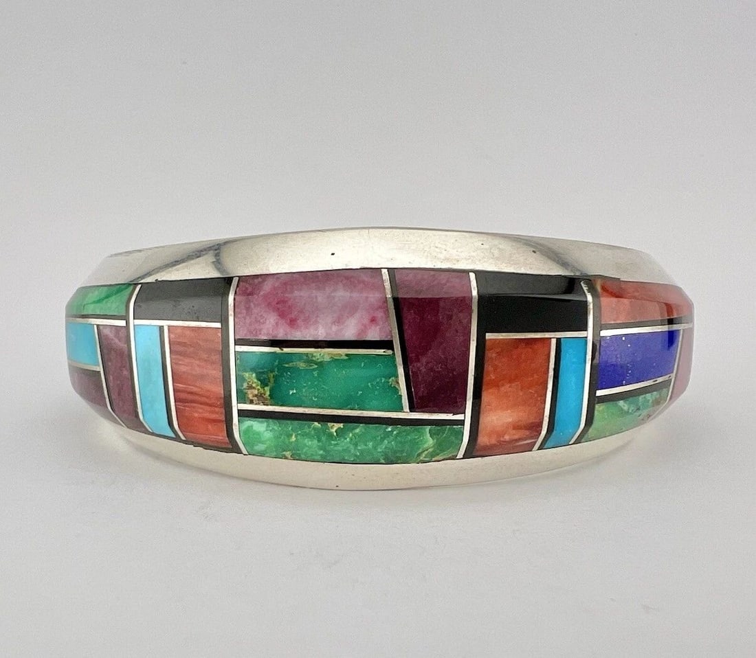 VTG GILBERT NELSON NAVAJO STERLING SILVER MULTI GEM FLUSH CUFF BRACELET 56.5G: VTG GILBERT NELSON NAVAJO STERLING SILVER MULTI GEM FLUSH CUFF BRACELET 56.5G Vtg Gilbert Nelson Navajo Sterling Silver Multi Gem Flush Cuff Bracelet 56.5g Cuff is 5 1/2" tip to Tip and has a 1 1/8" W