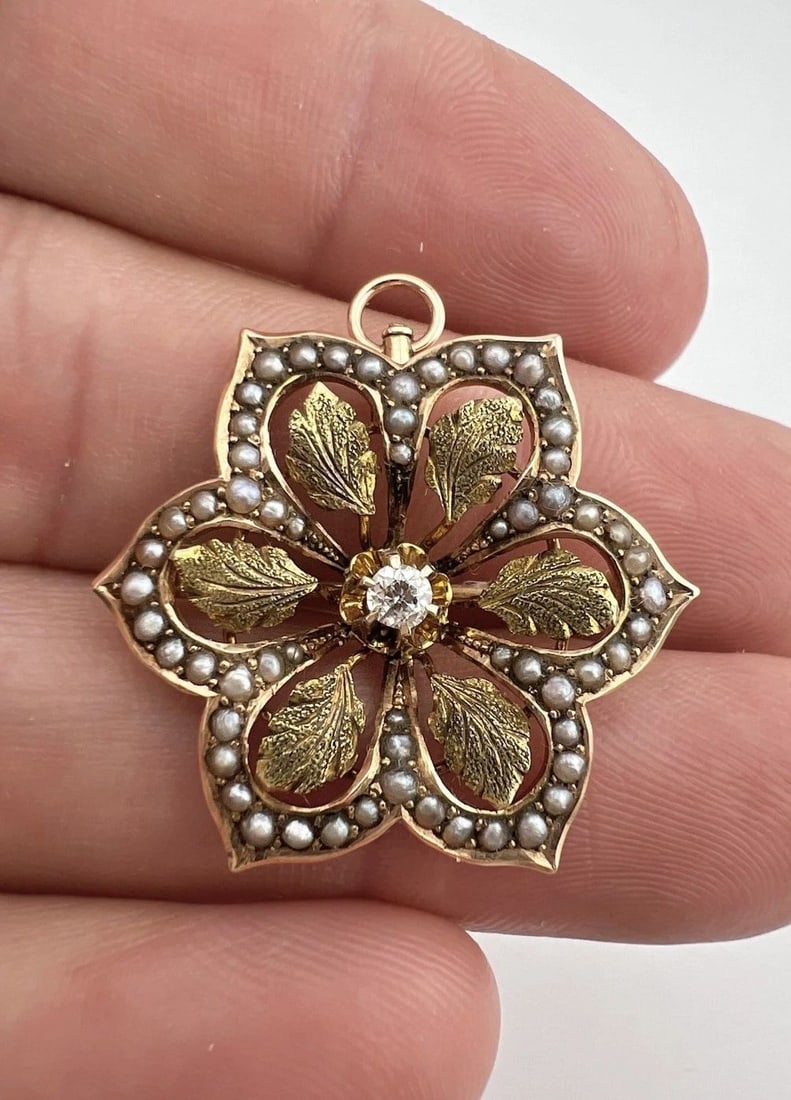 VICTORIAN 10K GOLD EUROPEAN CUT DIAMOND & SEED PEARL FLOWER SUN PIN PENDANT: VICTORIAN 10K GOLD EUROPEAN CUT DIAMOND & SEED PEARL FLOWER SUN PIN PENDANT Victorian 10k Gold European Cut Diamond & Seed Pearl Flower Sun Pin Pendant Size: 1" Tall By 1 1/8" Wide Weight: 4.3 Grams o