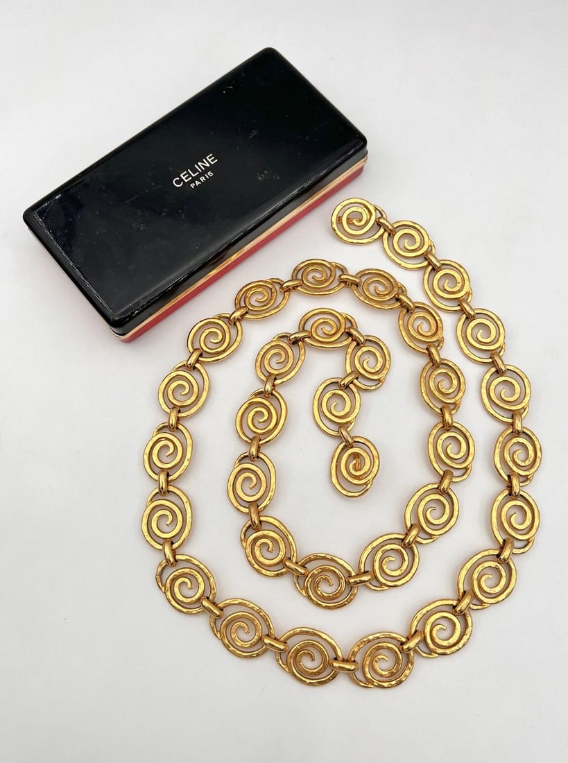 VINTAGE CELINE GOLD SPIRAL LOGO CHAIN LINK CHARM BELT 44?? INCH LENGTH W/ BOX: VINTAGE CELINE GOLD SPIRAL LOGO CHAIN LINK CHARM BELT 44” INCH LENGTH W/ BOX Vintage CELINE Gold Spiral Logo Chain Link Charm Belt 44” Inch Length W/ Box Size: 44"long By 1" Wide Adjustabl