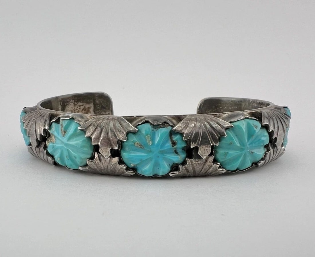 VINTAGE LOYOLITA TSATTIE ZUNI CARVED TURQUOISE STERLING SILVER CUFF BRACELET: VINTAGE LOYOLITA TSATTIE ZUNI CARVED TURQUOISE STERLING SILVER CUFF BRACELET Vintage Loyolita Tsattie Zuni Carved Turquoise Sterling Silver Cuff Bracelet Cuff is 5 1/4" tip to Tip and has a 1" Wide - 