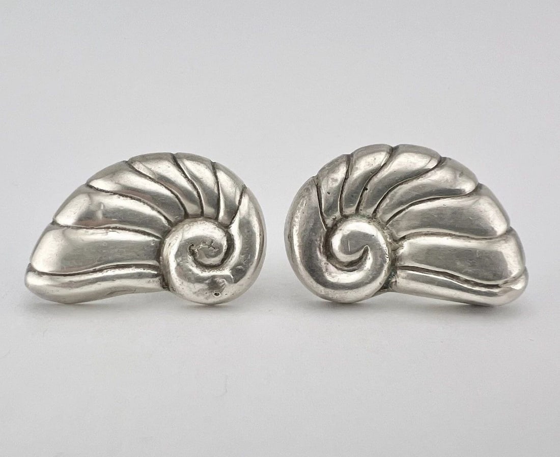 WILLIAM SPRATLING TAXCO MEXICO STERLING SILVER NAUTILUS CONCH SHELL EARRINGS: WILLIAM SPRATLING TAXCO MEXICO STERLING SILVER NAUTILUS CONCH SHELL EARRINGS Antique William Spratling Taxco Mexico Sterling Silver Nautilus Conch Shell Earrings Size: 1 3/8" Tall By Over 1" Wide Meta