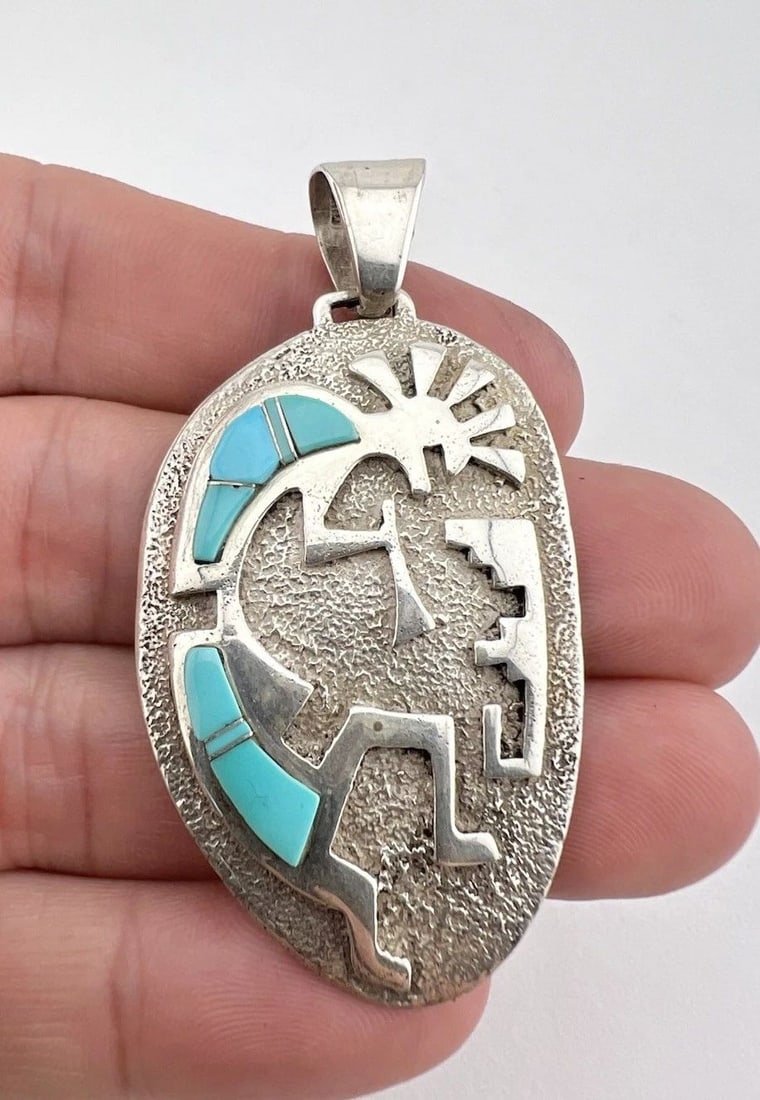 VTG JIMMY SECATERO NAVAJO CAST STERLING SILVER FLUSH TURQUOISE KOKOPELLI PENDANT: VTG JIMMY SECATERO NAVAJO CAST STERLING SILVER FLUSH TURQUOISE KOKOPELLI PENDANT Vtg Jimmy Secatero Navajo Cast Sterling Silver Flush Turquoise Kokopelli Pendant Size: Just Under 2 1/2" Tall With bail