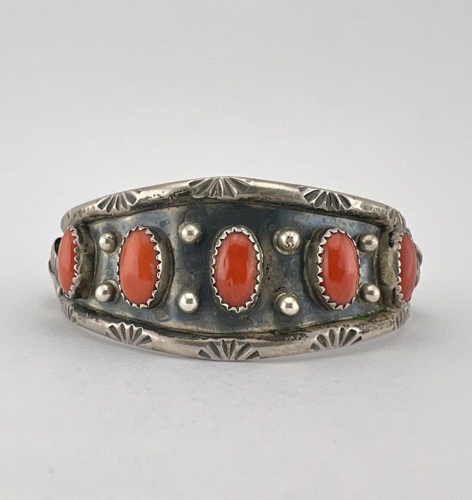 VTG NAVAJO STERLING SILVER 5 MEDITERRANEAN BRANCH CORAL STAMPED CUFF BRACELET: VTG NAVAJO STERLING SILVER 5 MEDITERRANEAN BRANCH CORAL STAMPED CUFF BRACELET Vtg Navajo Sterling Silver 5 Mediterranean Branch Coral Stamped Cuff Bracelet Cuff is 5 1/8" tip to Tip and has a 3/4" Wid