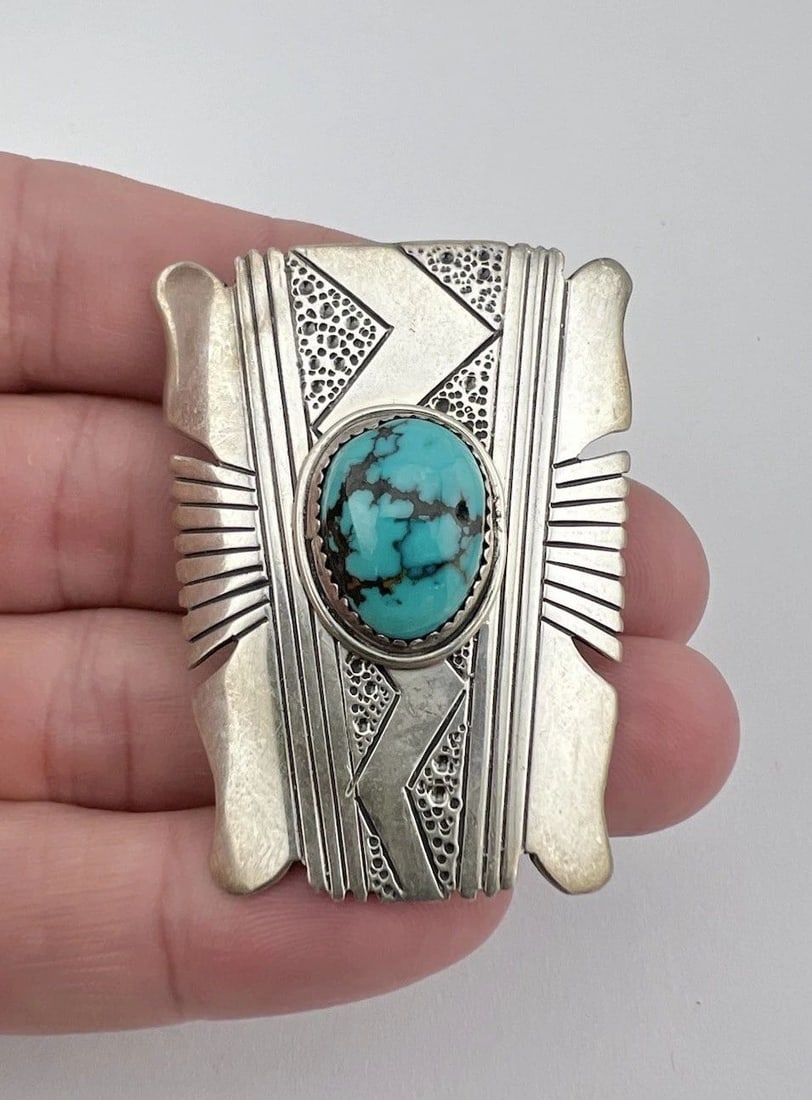 WILL DENETDALE NAVAJO STERLING SILVER SPIDERWEB TURQUOISE STAMPED BOLO TIE 2": WILL DENETDALE NAVAJO STERLING SILVER SPIDERWEB TURQUOISE STAMPED BOLO TIE 2" Vtg Will Denetdale Navajo Sterling Silver Spiderweb Turquoise Stamped Bolo Tie 2" Size: Around 2" Tall by 1 5/8" Wide at T