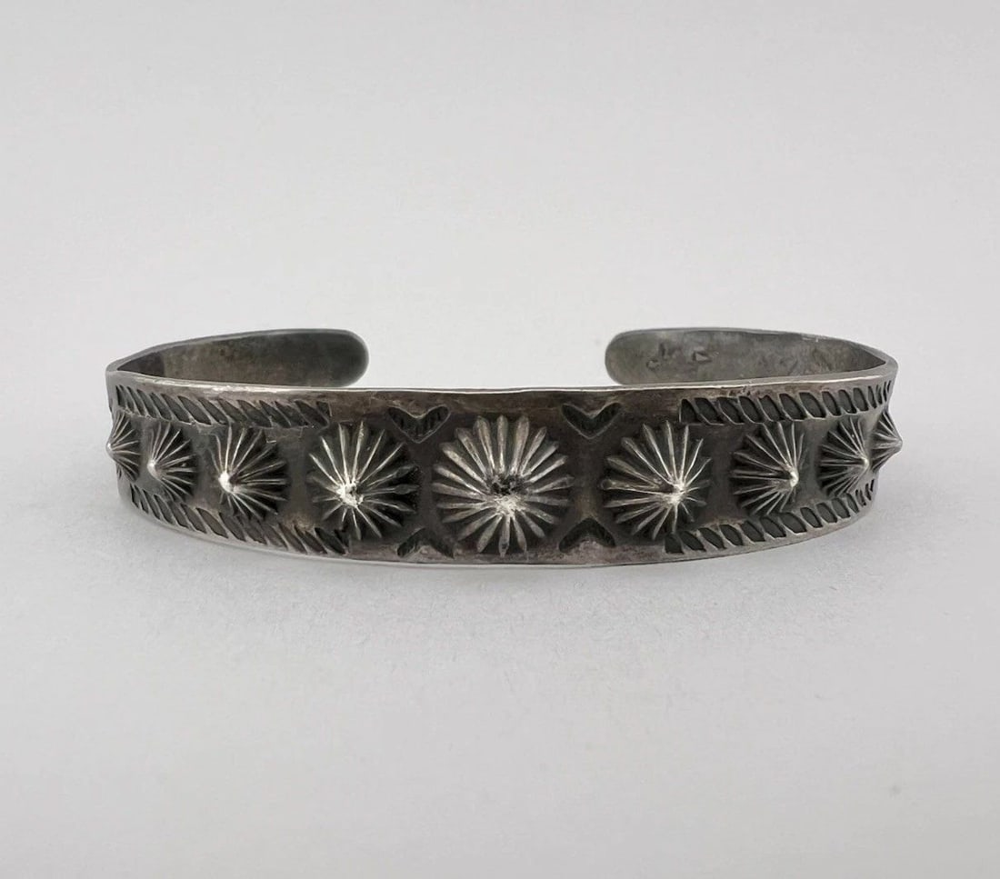 EARLY FRED HARVEY ERA NAVAJO SILVER REPOUSSE SPIKE STAMPED ARROW CUFF BRACELET: EARLY FRED HARVEY ERA NAVAJO SILVER REPOUSSE SPIKE STAMPED ARROW CUFF BRACELET Early Fred Harvey Era Navajo Silver REPOUSSE Spike Stamped Arrow Cuff Bracelet Cuff is Under 5 1/2" tip to Tip and has Ju