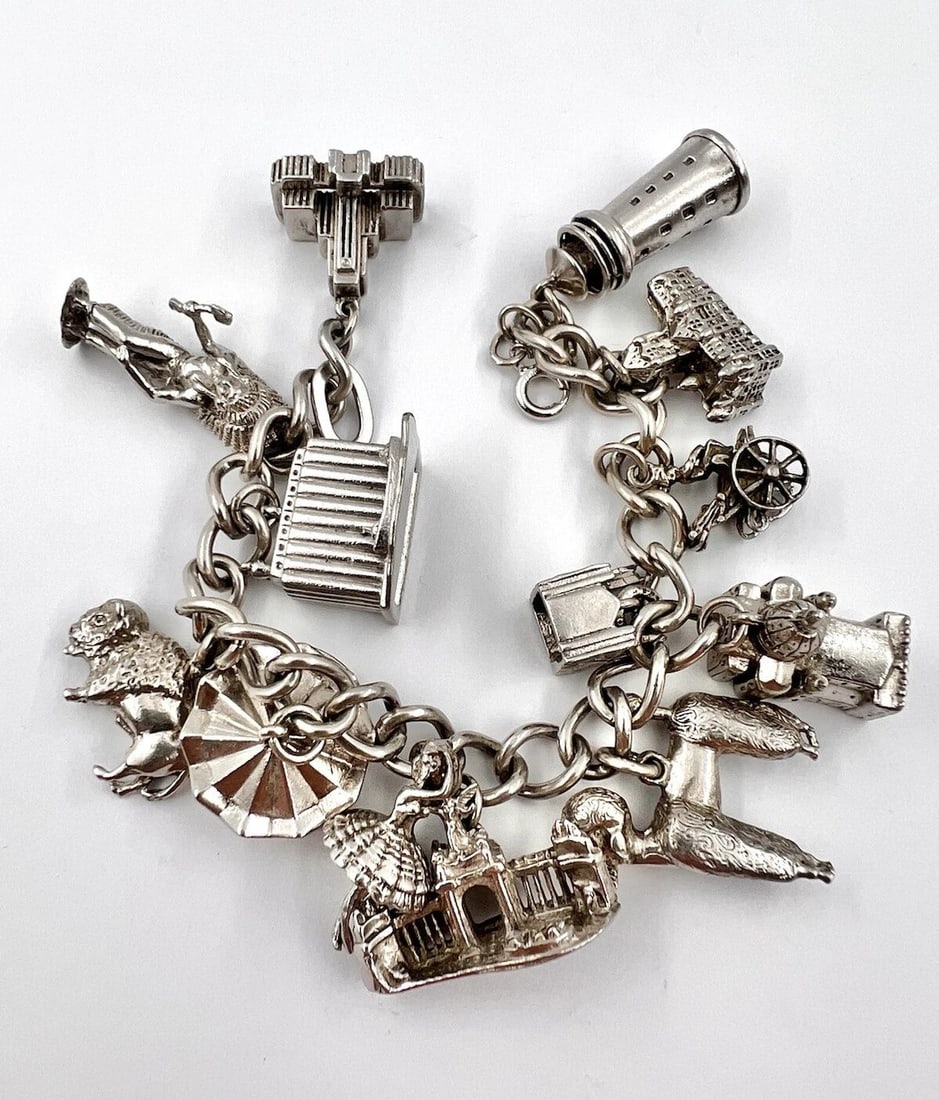 99.3 G VTG WORLD TRAVLER STERLING SILVER MASSIVE JUMBO SIZE 13 CHARM BRACELET: 99.3 G VTG WORLD TRAVLER STERLING SILVER MASSIVE JUMBO SIZE 13 CHARM BRACELET 99.3 g Vtg WORLD TRAVLER Sterling Silver MASSIVE JUMBO Size 13 Charm Bracelet Metal: Sterling Silver Weight is 99.3 Grams 