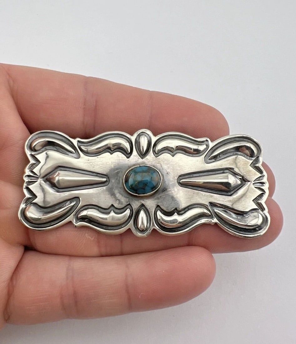 VTG NAVAJO STERLING SILVER CANDELARIA TURQUOISE STAMPED CONCHO BROOCH PIN 2.75": VTG NAVAJO STERLING SILVER CANDELARIA TURQUOISE STAMPED CONCHO BROOCH PIN 2.75" Vtg Navajo Sterling Silver Candelaria Turquoise Stamped Concho Brooch Pin 2.75" Size: 1 1/4" Tall by 2 3/4" Wide Metal: 