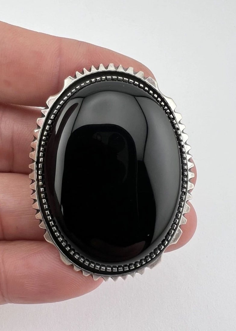 VINTAGE P.ATTAKAI NAVAJO STERLING SILVER ONYX STAMPED OVAL PIN PENDANT 2": VINTAGE P.ATTAKAI NAVAJO STERLING SILVER ONYX STAMPED OVAL PIN PENDANT 2" Vintage P.ATTAKAI Navajo Sterling Silver Onyx Stamped Oval Pin Pendant 2" Size: Around 2" Tall by 1 1/2" Wide Weight is 26.6 G