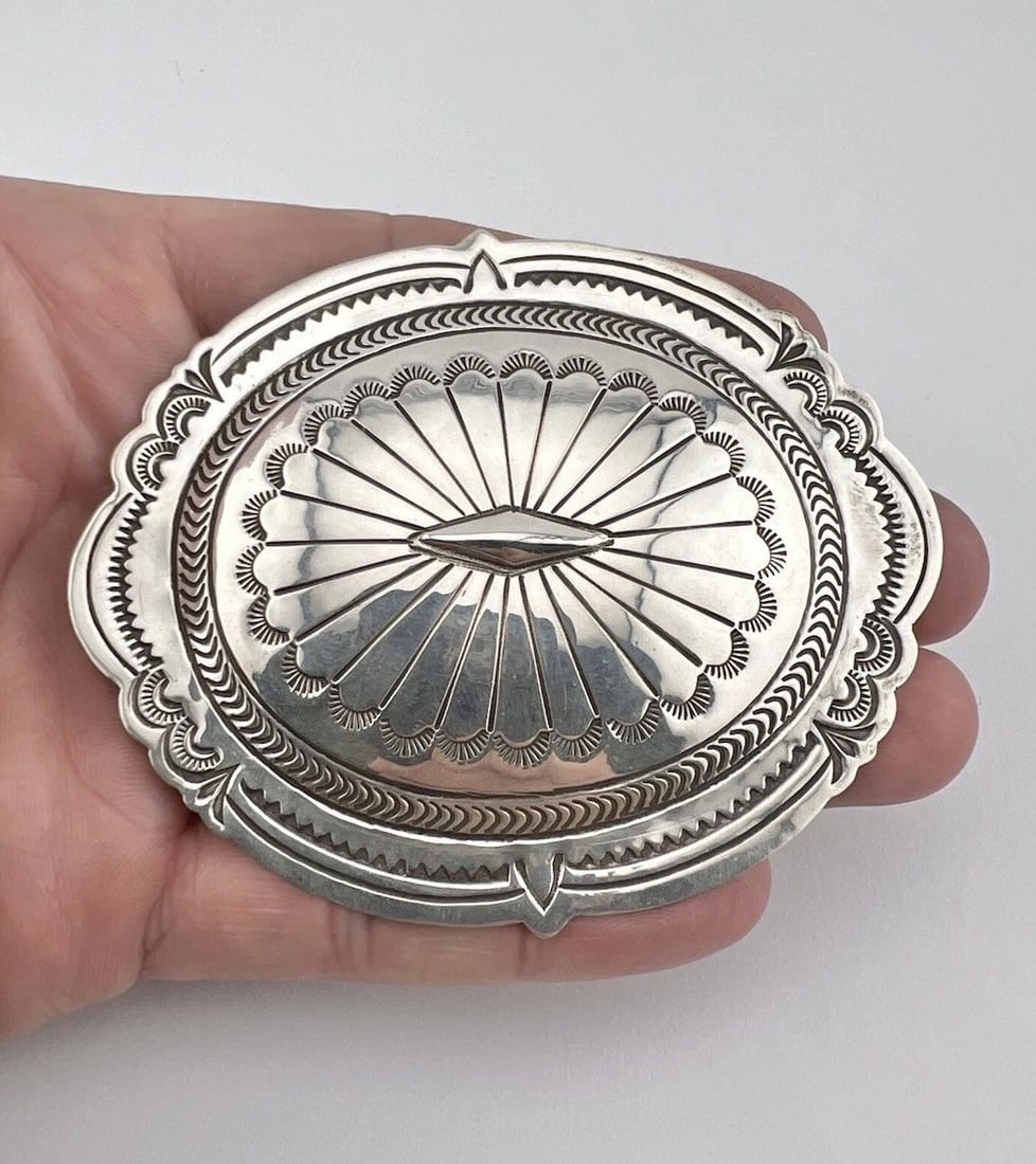 HUGE VTG SUZIE JAMES NAVAJO STERLING SILVER STAMPED CONCHO BROOCH PIN 3 3/8": HUGE VTG SUZIE JAMES NAVAJO STERLING SILVER STAMPED CONCHO BROOCH PIN 3 3/8" HUGE Vtg Suzie James Navajo Sterling Silver Stamped Concho Brooch Pin 3 3/8" Size: 3 3/8" Wide by Just Under 3" Tall Metal: