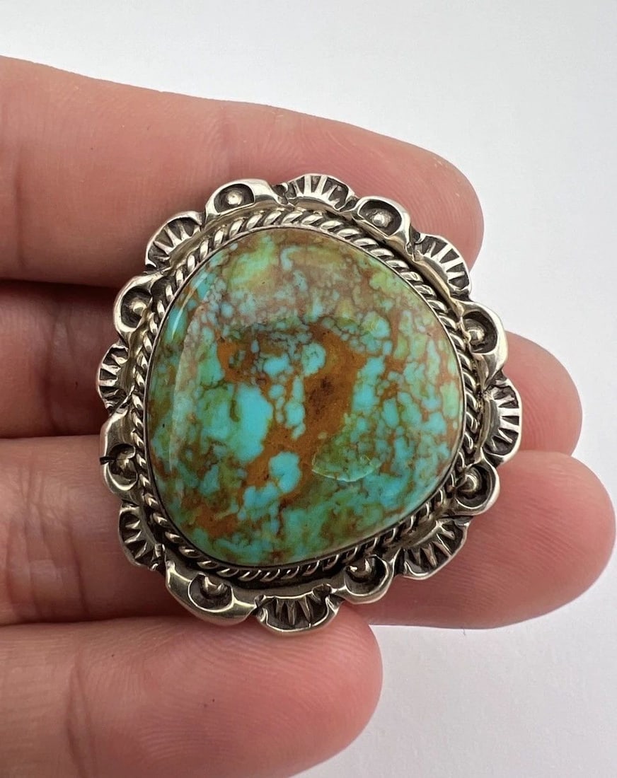 VTG NAVAJO STERLING SILVER WEBBED TURQUOISE MOUNTAIN STAMPED BOLO TIE 1.5": VTG NAVAJO STERLING SILVER WEBBED TURQUOISE MOUNTAIN STAMPED BOLO TIE 1.5" Vtg Navajo Sterling Silver Webbed Turquoise Mountain Stamped Bolo Tie Size: 1 1/2" Tall by 1 3/8" Wide Weight is 21.2 Grams o