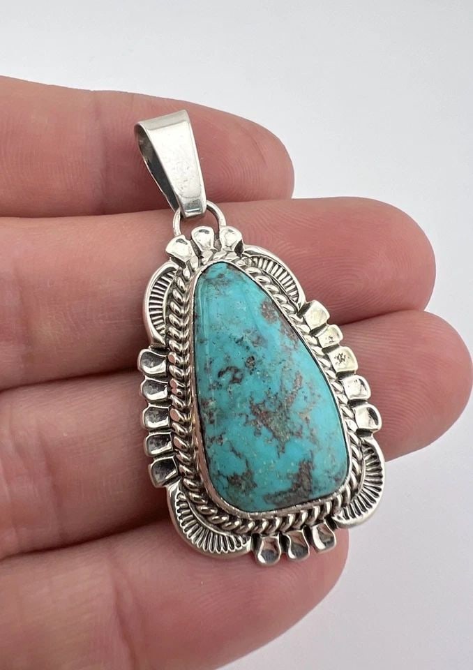 WILL DENETDALE NAVAJO STERLING SILVER BLUE KINGMAN TURQUOISE STAMPED PENDANT 2": WILL DENETDALE NAVAJO STERLING SILVER BLUE KINGMAN TURQUOISE STAMPED PENDANT 2" Will Denetdale Navajo Sterling Silver Blue Kingman Turquoise Stamped Pendant 2" Size: 2" Tall With Bail & 1" Wide Weight