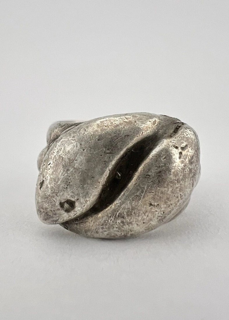 EARLY 1920'S OLD NAVAJO HARVEY INGOT SILVER COILED DOUBLE HEAD SNAKE RING: EARLY 1920'S OLD NAVAJO HARVEY INGOT SILVER COILED DOUBLE HEAD SNAKE RING Early 1920's OLD Navajo Harvey Ingot Silver Coiled Double Head Snake Ring Ring Size: 4 Weight is 10.0 Grams on my scale Metal: