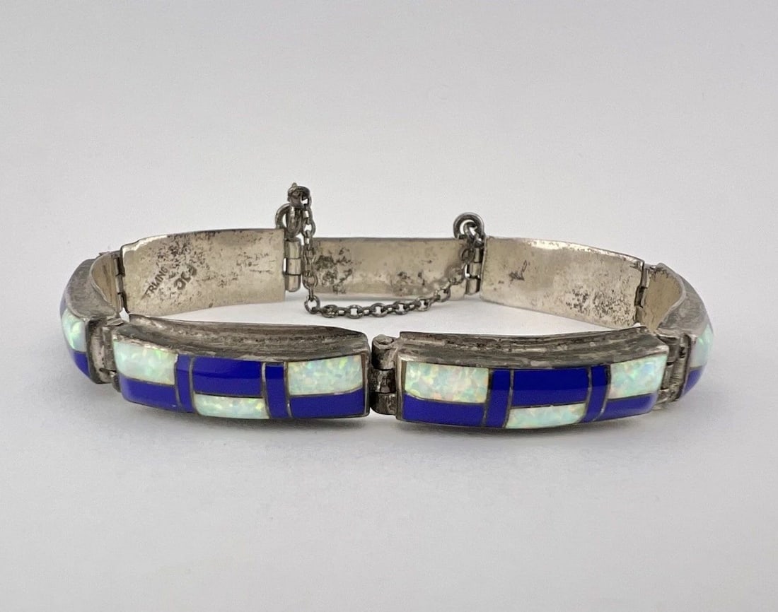 VINTAGE NAVAJO STERLING SILVER FLUSH LAPIS LAZULI & FIRE OPAL LINK BRACELET: VINTAGE NAVAJO STERLING SILVER FLUSH LAPIS LAZULI & FIRE OPAL LINK BRACELET Vintage Navajo Sterling Silver Flush Lapis Lazuli & Fire Opal Link Bracelet Size: 7" Long Tip To Tip Bracelet Is 3/8" (9mm) 