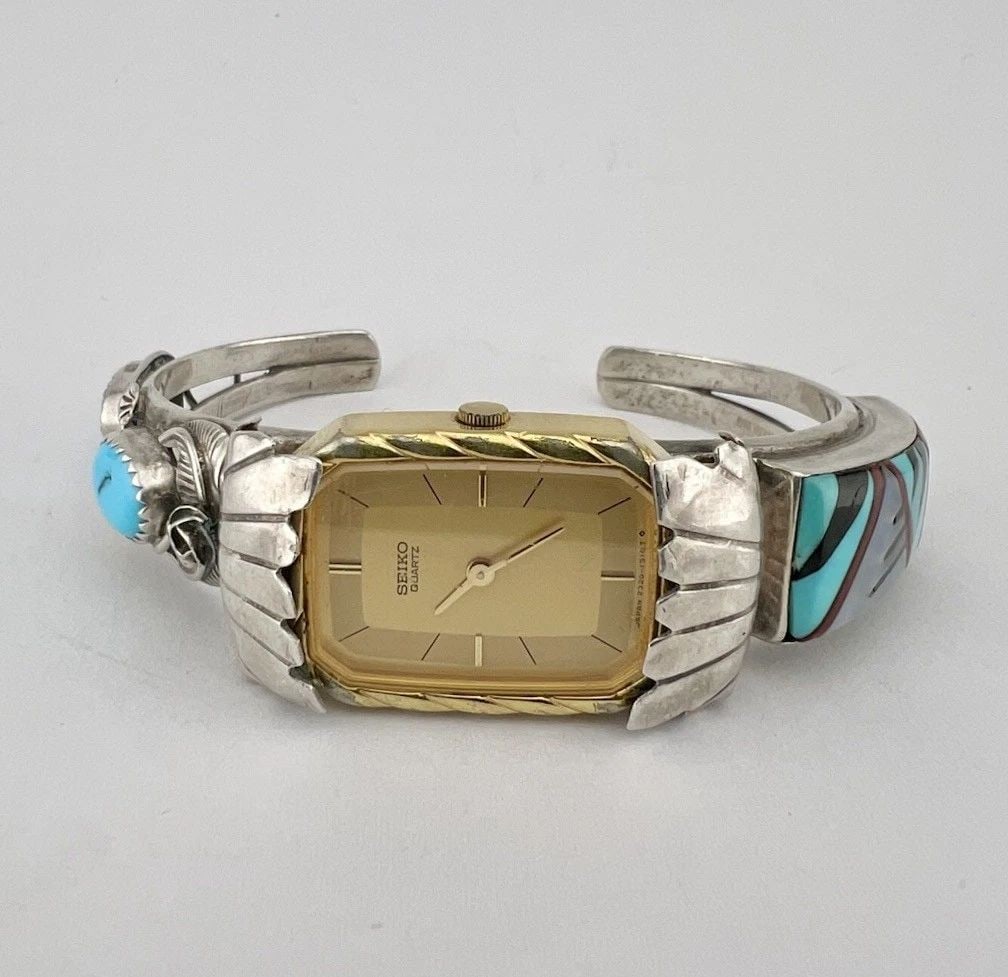 VTG NAVAJO STERLING SILVER TURQUOISE CORAL STAMPED WOMEN'S CUFF WATCH BRACELET: VTG NAVAJO STERLING SILVER TURQUOISE CORAL STAMPED WOMEN'S CUFF WATCH BRACELET Vtg Navajo Sterling Silver Turquoise Coral Stamped Women's Cuff Watch Bracelet Cuff is 5 1/4" tip to Tip and has an Aroun
